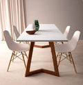 Silestone quartz dining table with white marble-look finish and wood base — premium quartz countertops installed by Signature Stone Las Vegas