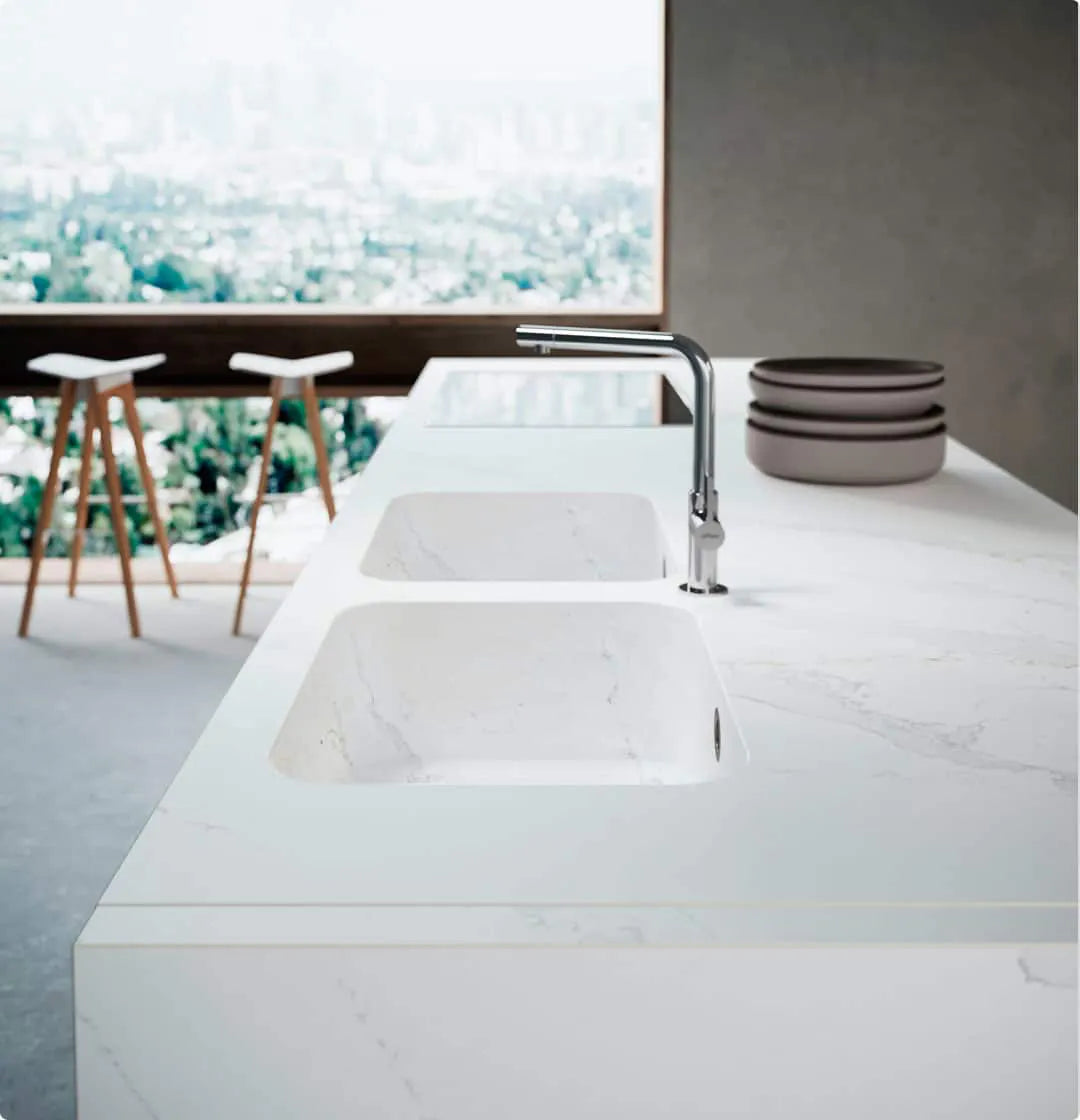 Silestone kitchen island with integrated white sink and chrome faucet — modern quartz countertops installed by Signature Stone Las Vegas