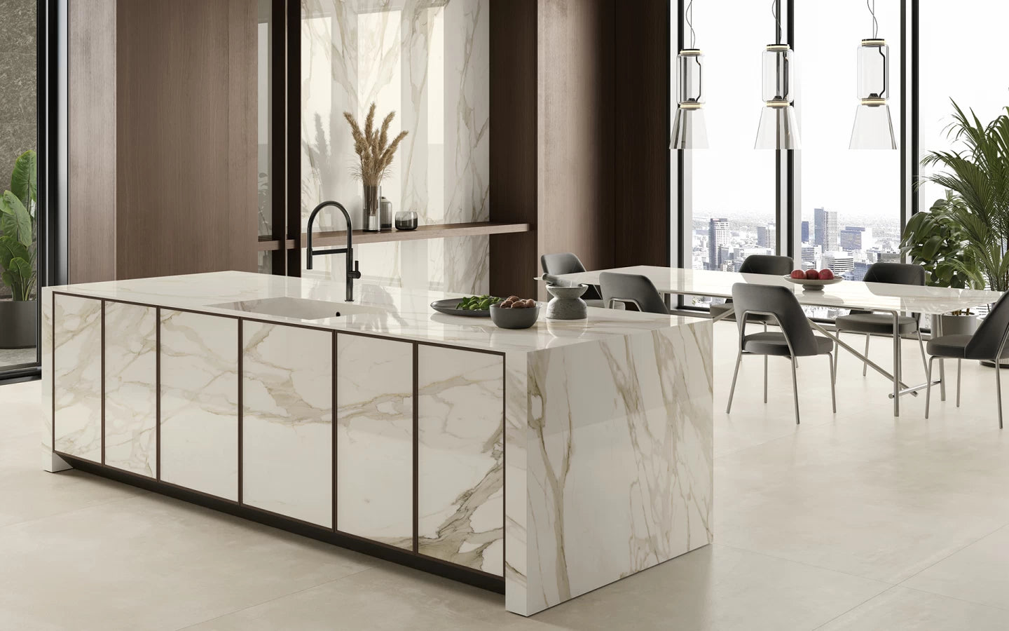 Calacatta Bernini kitchen island with white marble veining and waterfall edge — expert countertop fabrication by Signature Stone Las Vegas