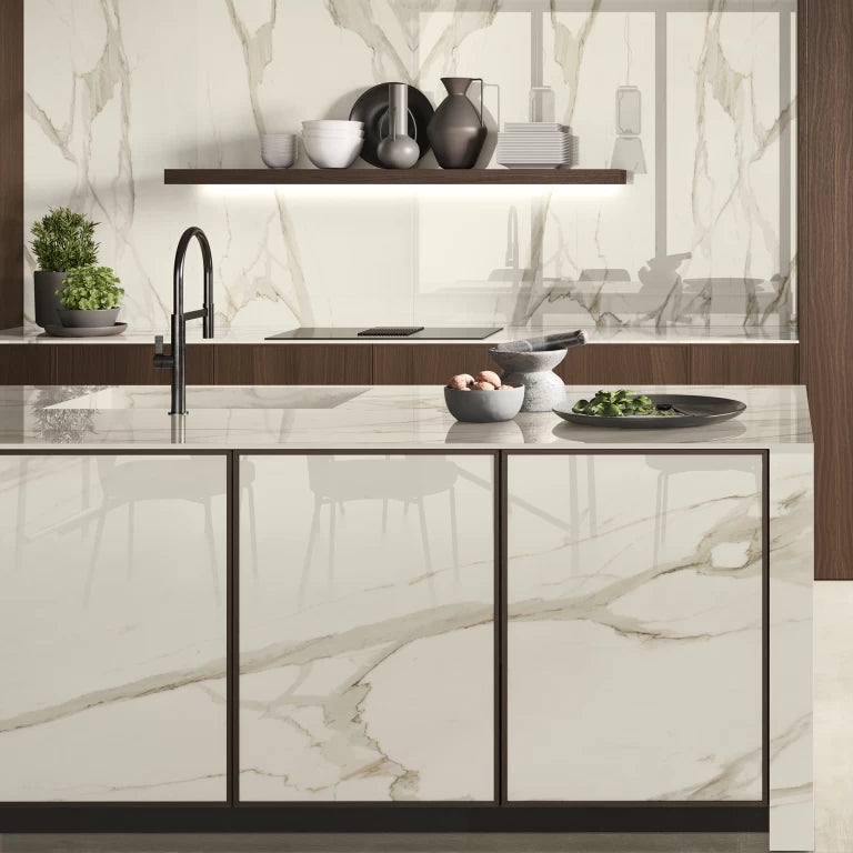 Calacatta Bernini kitchen island with polished white marble and dramatic gold veining — custom countertops fabricated and installed by Signature Stone LV