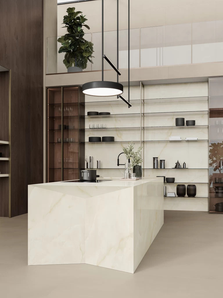 Onyx White kitchen island with waterfall edge and matching shelving in modern design — custom countertops fabricated and installed by Signature Stone LV