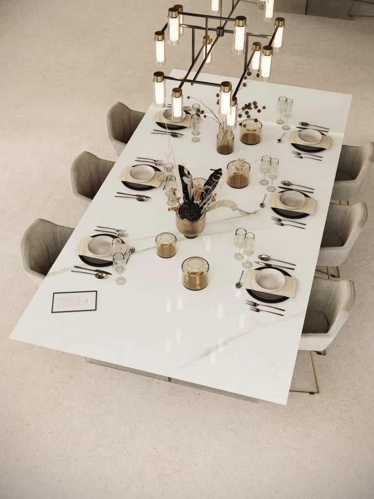 Calacatta Meraviglia quartz dining table with white marble veining and polished finish — custom countertops fabricated and installed by Signature Stone LV