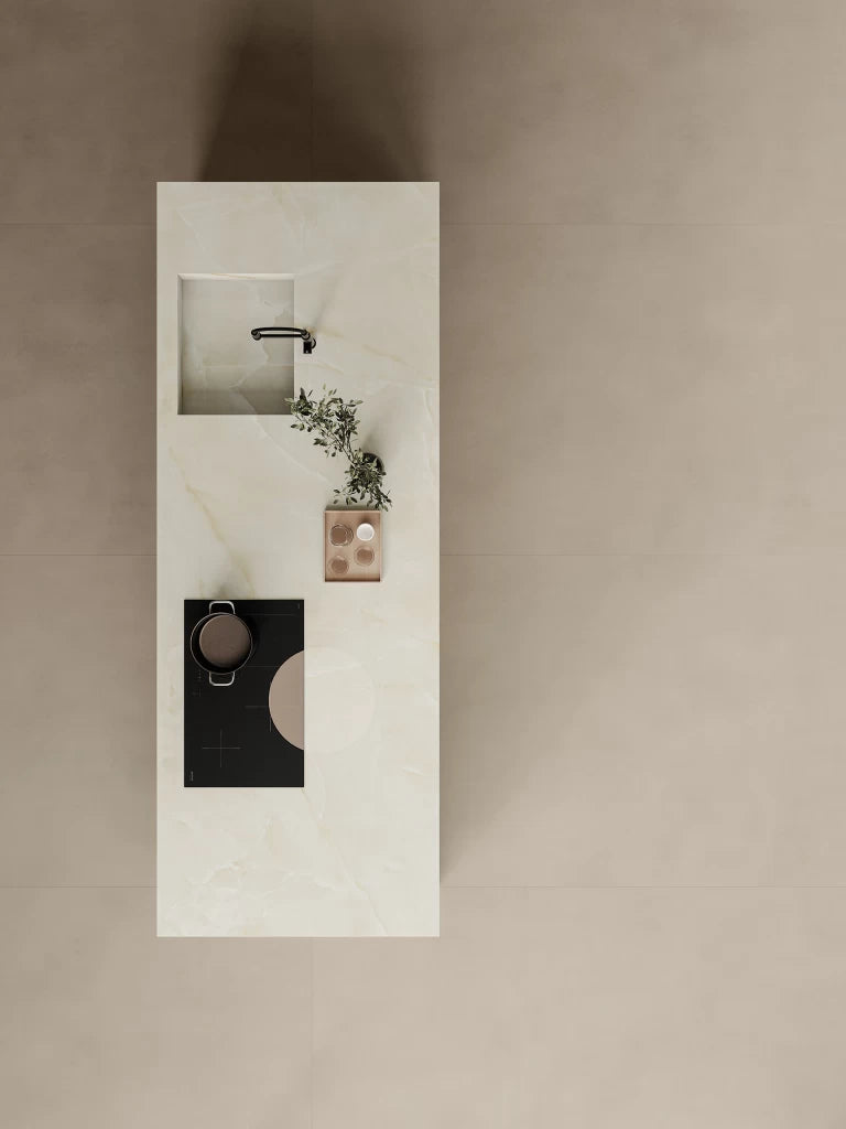 Onyx White kitchen island with sleek rectangular sink cutout and polished finish — custom countertops fabricated and installed by Signature Stone LV