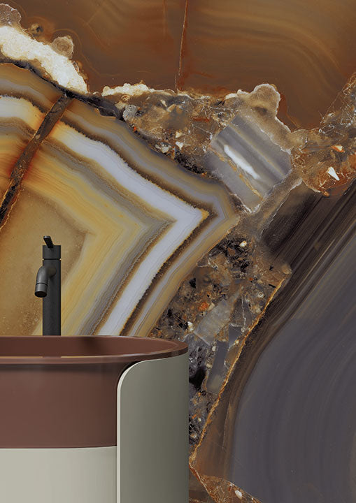 Agata Fuoco stone surface with dramatic banded patterns in warm browns and whites — expert countertop fabrication by Signature Stone Las Vegas