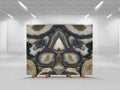 Agata Terra stone slab with symmetrical agate patterns in cream, blue and gold tones — luxury stone countertops installed by Signature Stone Las Vegas