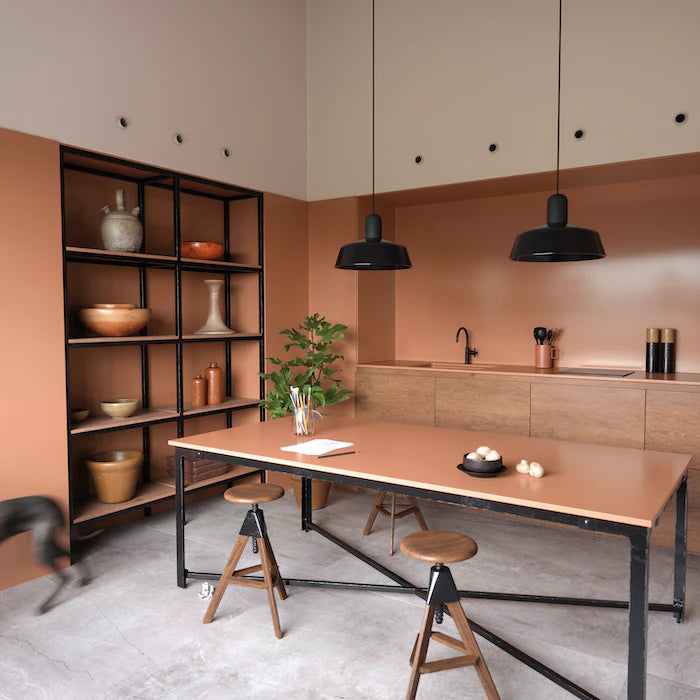 Silestone Arcilla Red quartz kitchen countertops and island in warm terracotta finish — premium quartz countertops near me by Signature Stone Las Vegas