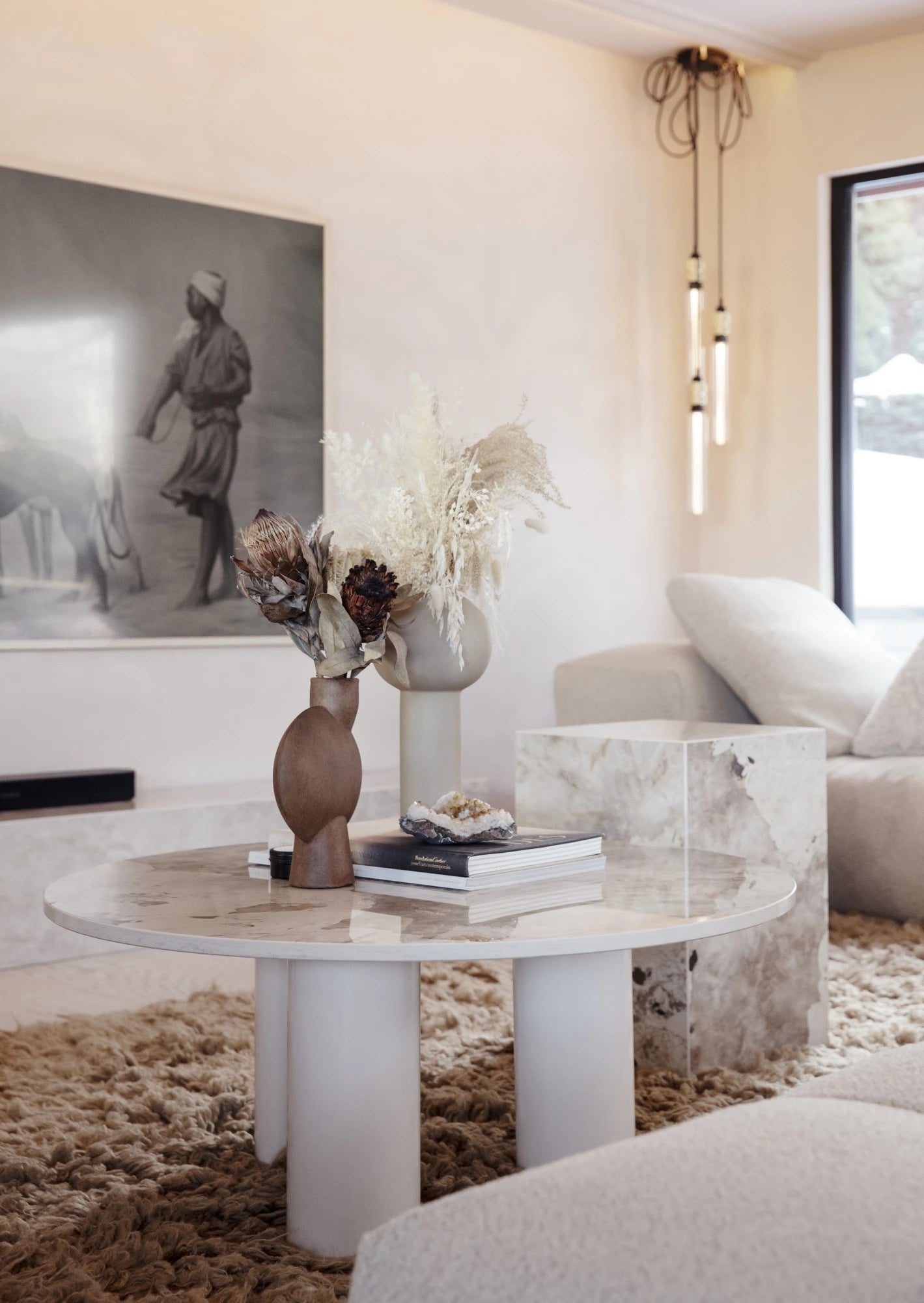 Dekton Arga coffee table featuring light marble-look finish with subtle veining — premium dekton surfaces fabricated and installed by Signature Stone LV