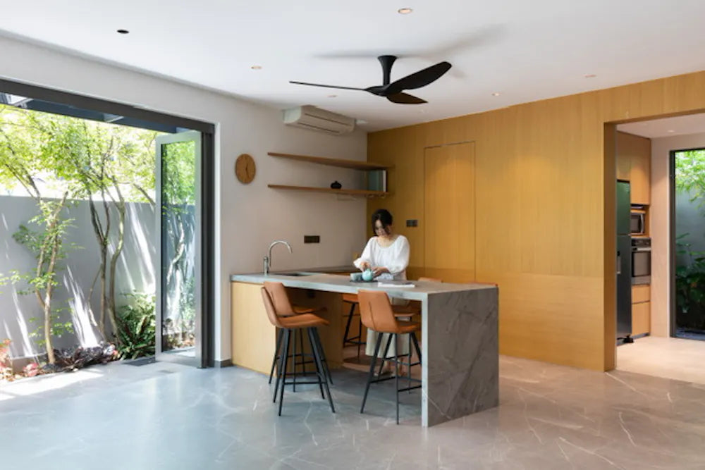 Silestone Ariel quartz kitchen island with waterfall edge and marble-like veining — premium quartz countertops near me by Signature Stone Las Vegas