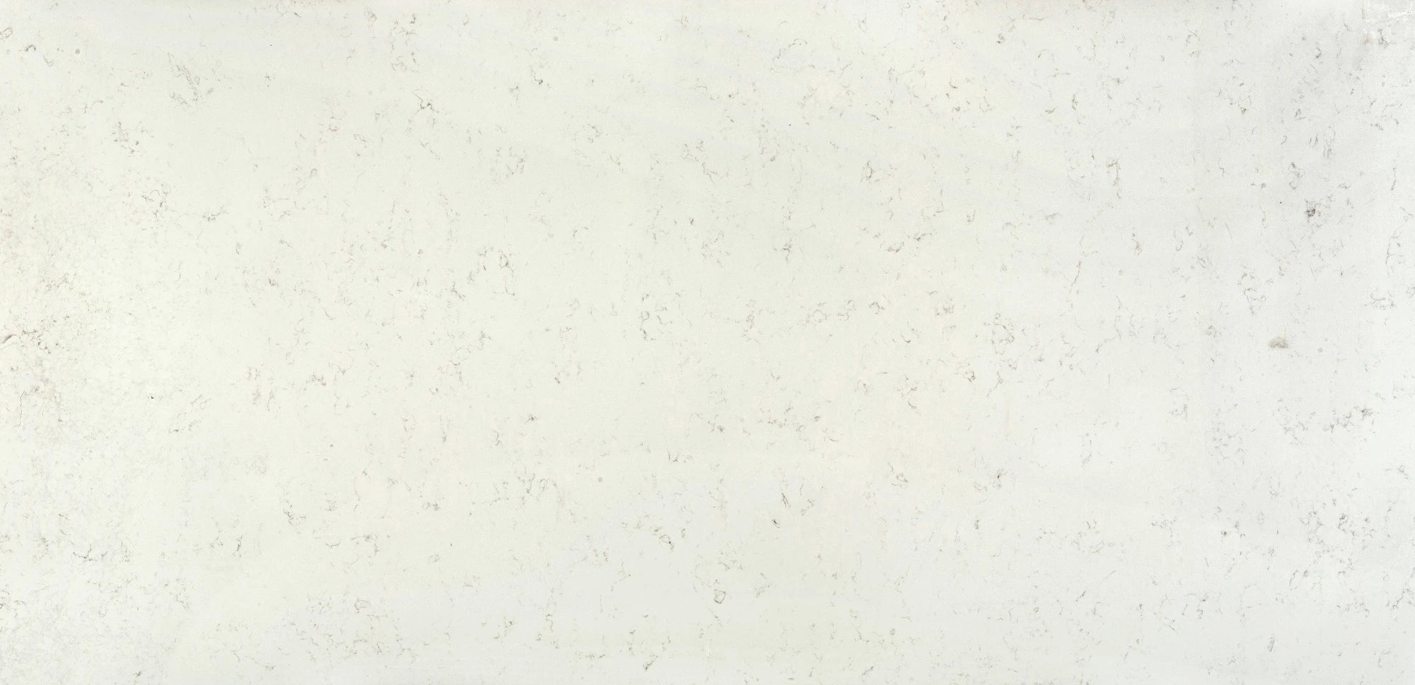 Silestone Ariel kitchen island with light cream speckled finish and straight edges — premium quartz countertops installed by Signature Stone Las Vegas