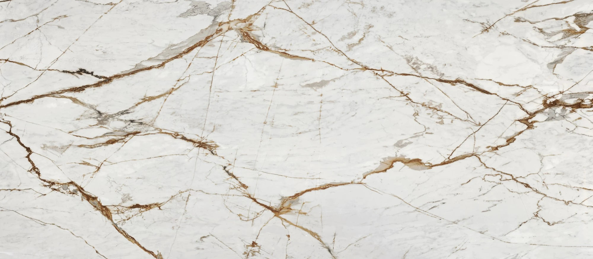 Dekton Awake slab surface with white base and golden brown veining — premium dekton countertops installed by Signature Stone Las Vegas