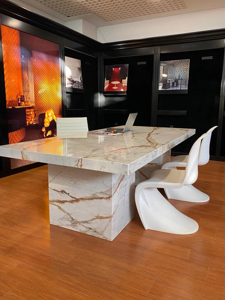 Dekton Awake office desk with white marble-look veining and waterfall edge — premium dekton surfaces fabricated and installed by Signature Stone LV