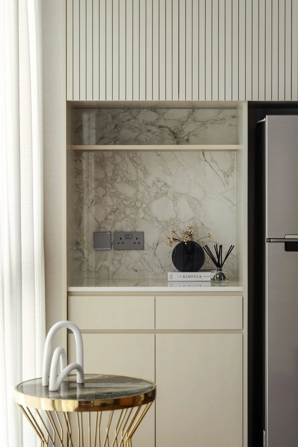 Dekton Bergen kitchen cabinetry with marble-look white and gray veining finish — dekton countertops installed by Signature Stone Las Vegas