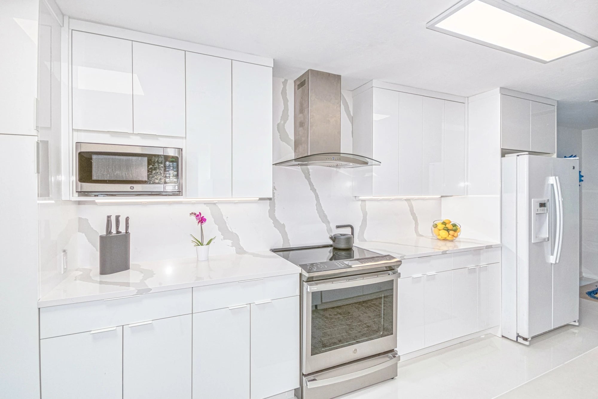 Silestone Bianco Calacatta kitchen countertops with white veining and glossy finish — premium quartz countertops near me by Signature Stone Las Vegas