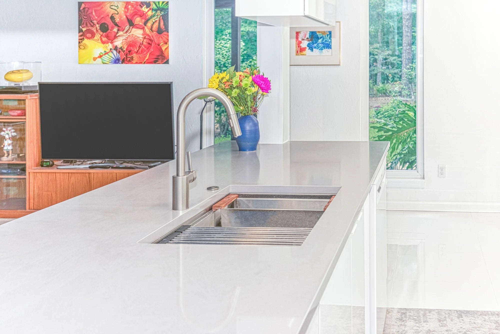 Silestone Bianco Calacatta kitchen island with white finish and undermount sink — premium quartz countertops installed by Signature Stone Las Vegas