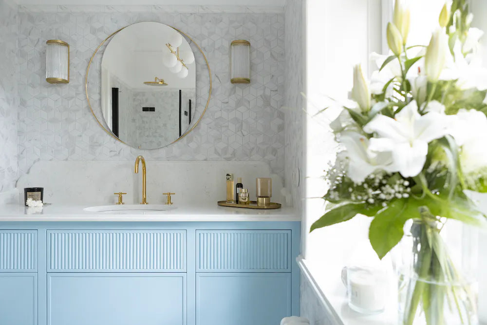 Silestone Blanco Orion quartz bathroom vanity with white marble-look finish and gold fixtures — quartz countertops near me by Signature Stone Las Vegas