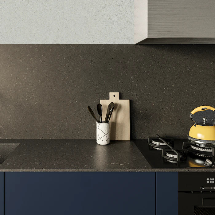 Silestone Brass Relish kitchen countertop with dark speckled finish and straight edge — engineered quartz countertops fabricated and installed by Signature S...