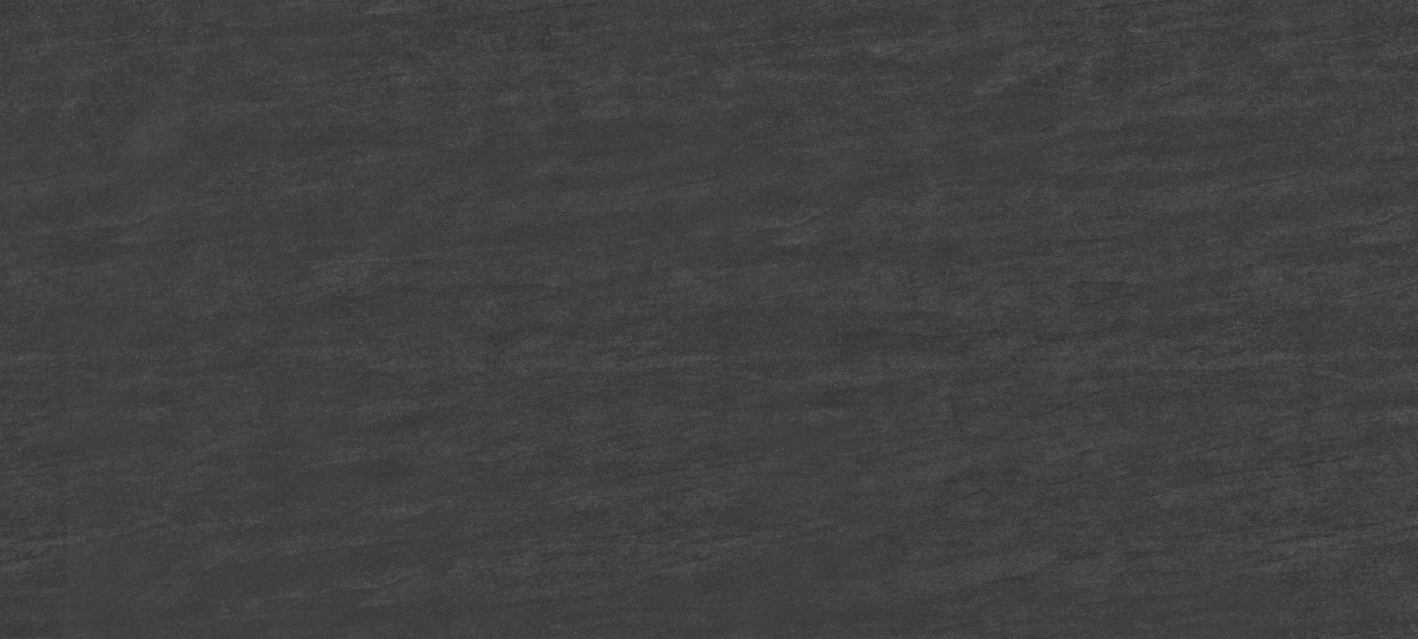 Dekton Bromo slab surface showcasing dark charcoal gray finish with subtle texture — premium dekton kitchen countertops by Signature Stone Las Vegas