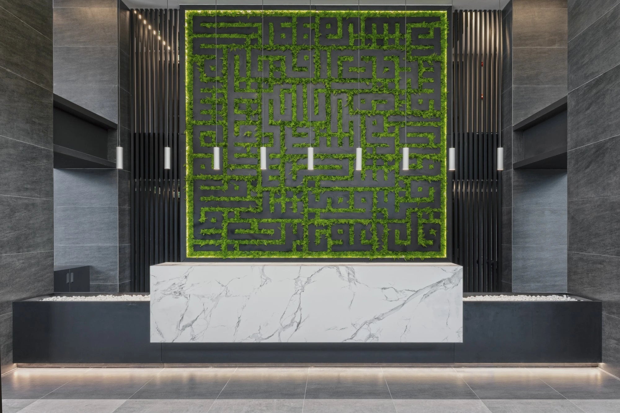 Dekton Bromo reception desk with white marble veining and matte finish — premium dekton kitchen countertops by Signature Stone Las Vegas