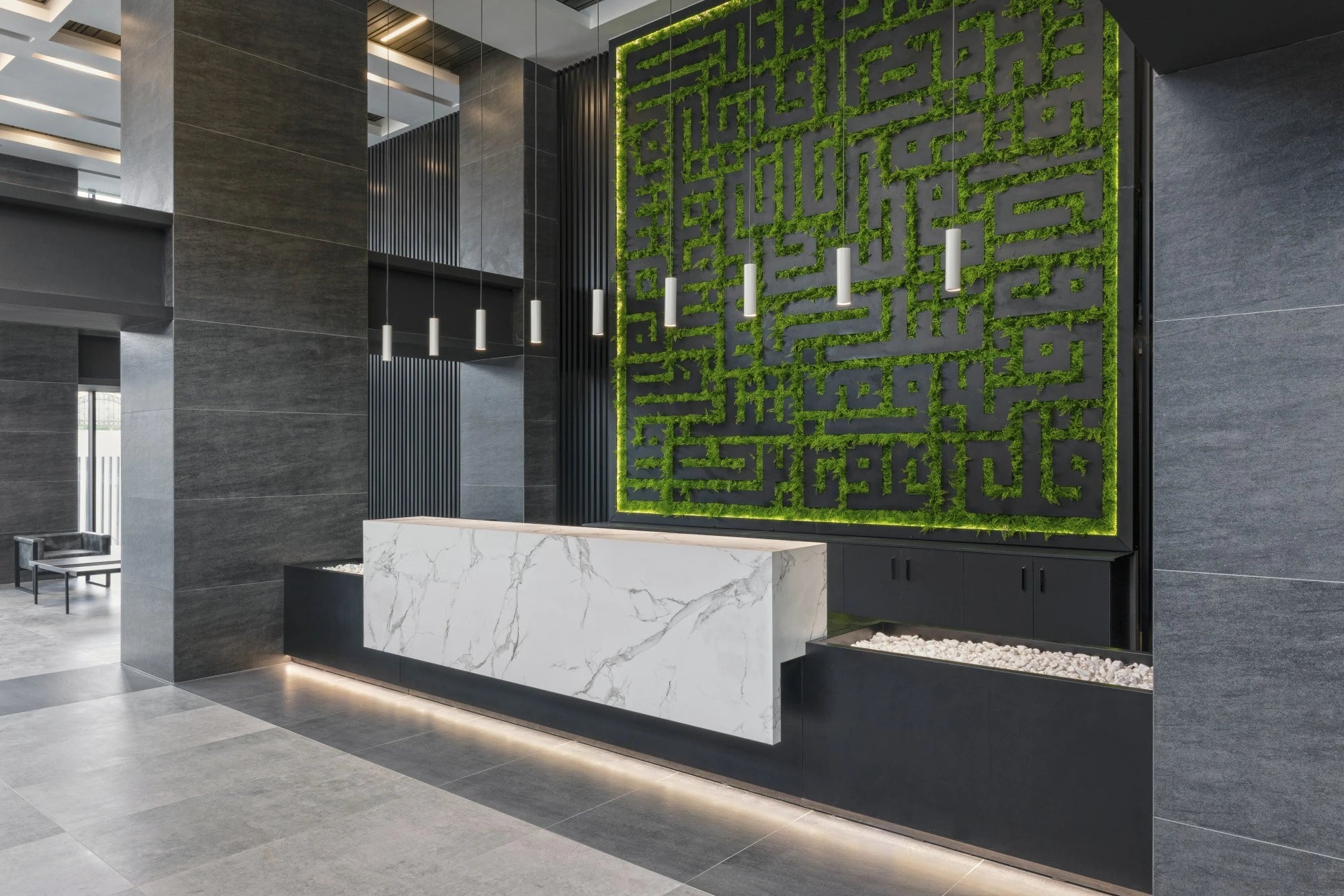 Dekton Bromo reception desk with white marble veining and sleek modern design — premium dekton surfaces fabricated and installed by Signature Stone LV