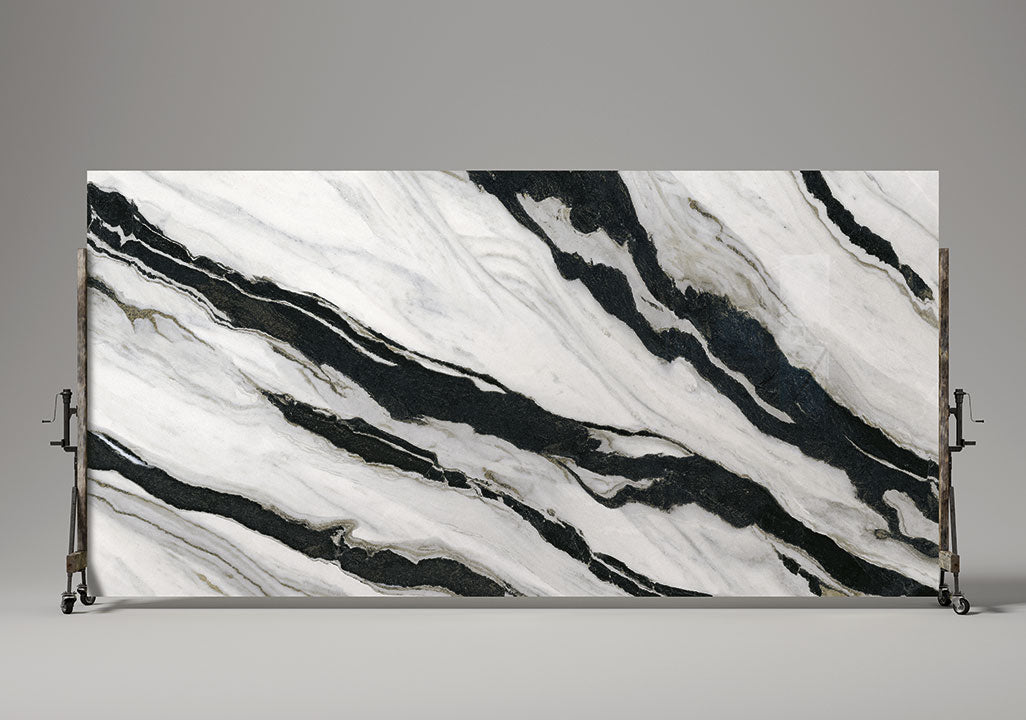 Calacatta Panda marble slab with dramatic black veining on white background — ideal for custom countertops fabricated and installed by Signature Stone LV