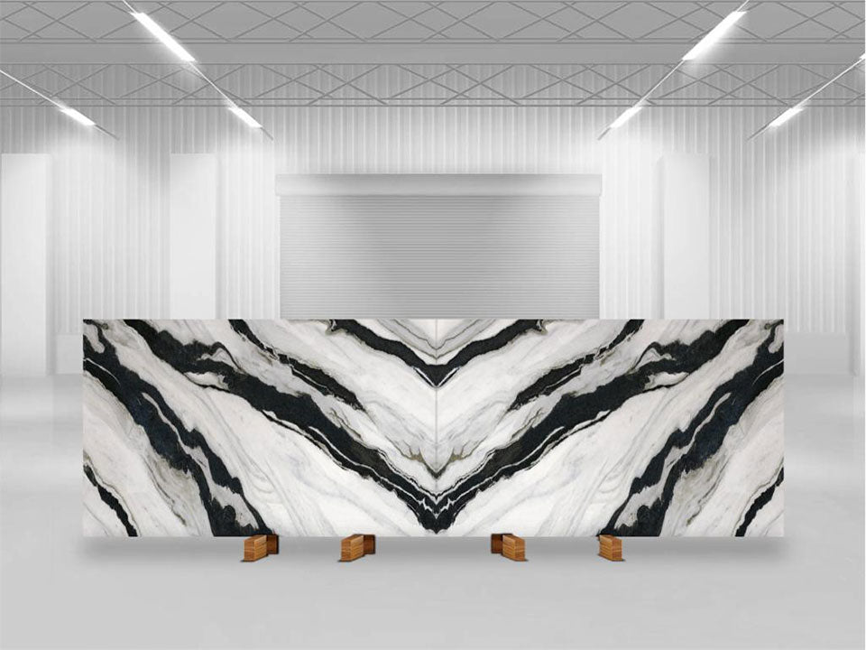 Calacatta Panda marble reception desk with dramatic black and white veining in book-matched pattern — expert countertop fabrication by Signature Stone Las Vegas