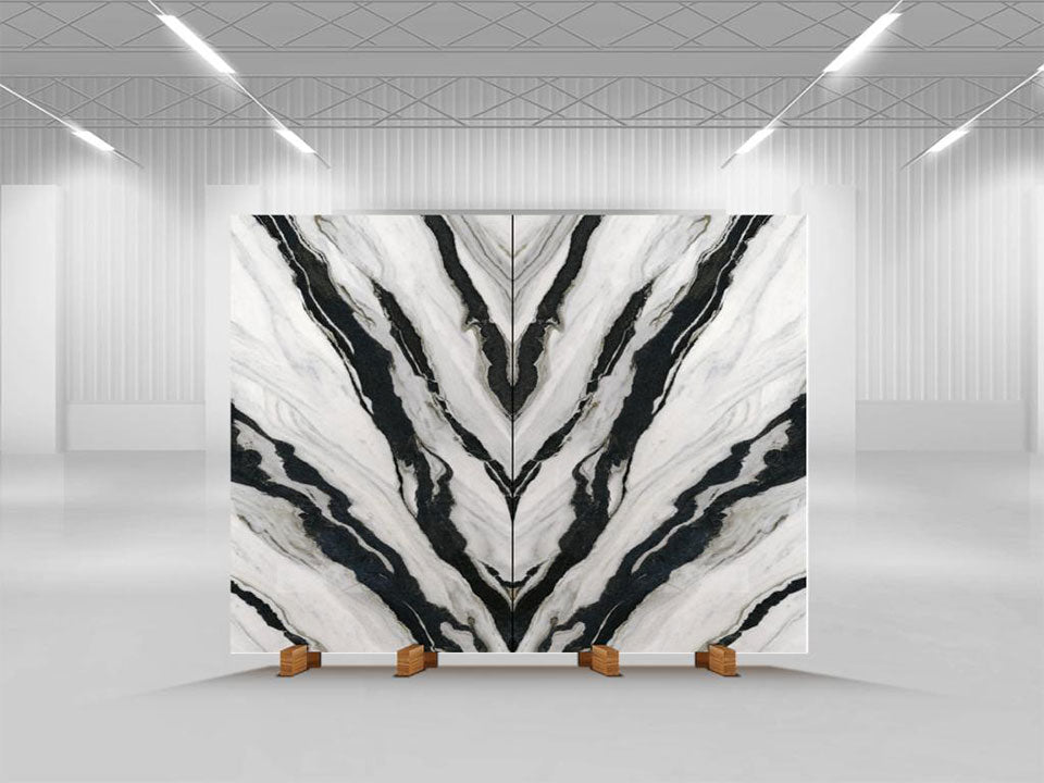 Calacatta Panda marble slab with dramatic black veining and white background in showroom — custom countertops fabricated and installed by Signature Stone LV