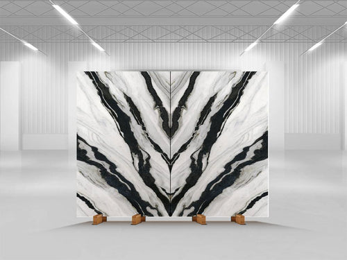 Calacatta Panda marble slab with dramatic black veining and white background in showroom — custom countertops fabricated and installed by Signature Stone LV