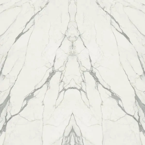 Calacatta Supremo marble surface with white background and dramatic gray veining — custom countertops fabricated and installed by Signature Stone LV