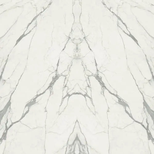 Calacatta Supremo marble surface with white background and dramatic gray veining — custom countertops fabricated and installed by Signature Stone LV