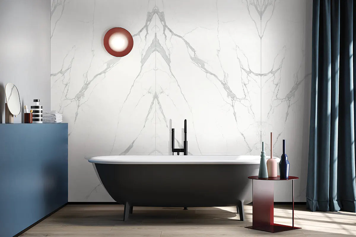 Calacatta Supremo marble bathroom wall with white background and gray veining — premium stone countertops installed by Signature Stone Las Vegas