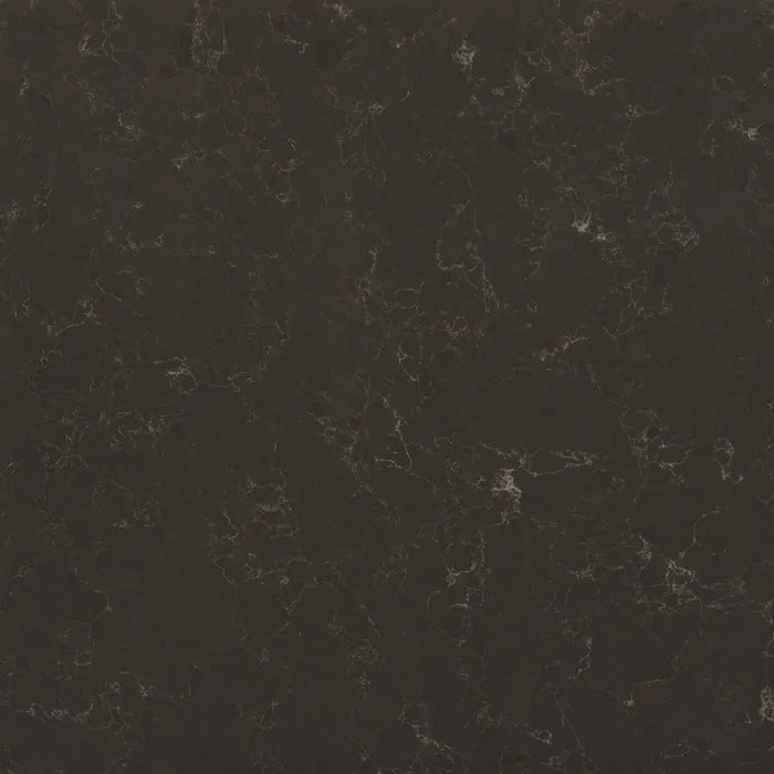 Silestone Calypso quartz slab featuring deep charcoal base with subtle white veining and matte finish — quartz countertops installed by Signature Stone Las V...