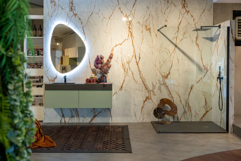 Silestone Calypso quartz bathroom vanity with dramatic white and gold veining and floating design — premium quartz countertops near me by Signature Stone Las...