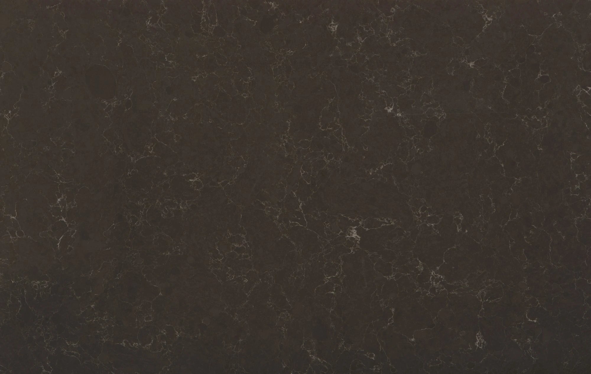 Silestone Calypso quartz surface with rich dark brown base and intricate golden veining in polished finish — quartz countertops near me by Signature Stone La...