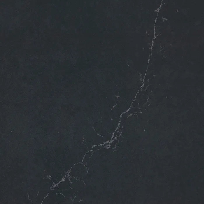 Silestone Charcoal Soapstone surface with dark gray base and subtle white veining — premium quartz countertops installed by Signature Stone Las Vegas