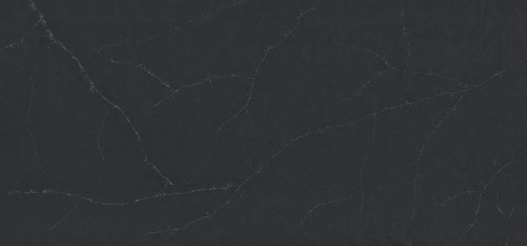 Silestone Charcoal Soapstone quartz surface with dark gray base and subtle white veining — premium quartz countertops near me by Signature Stone Las Vegas