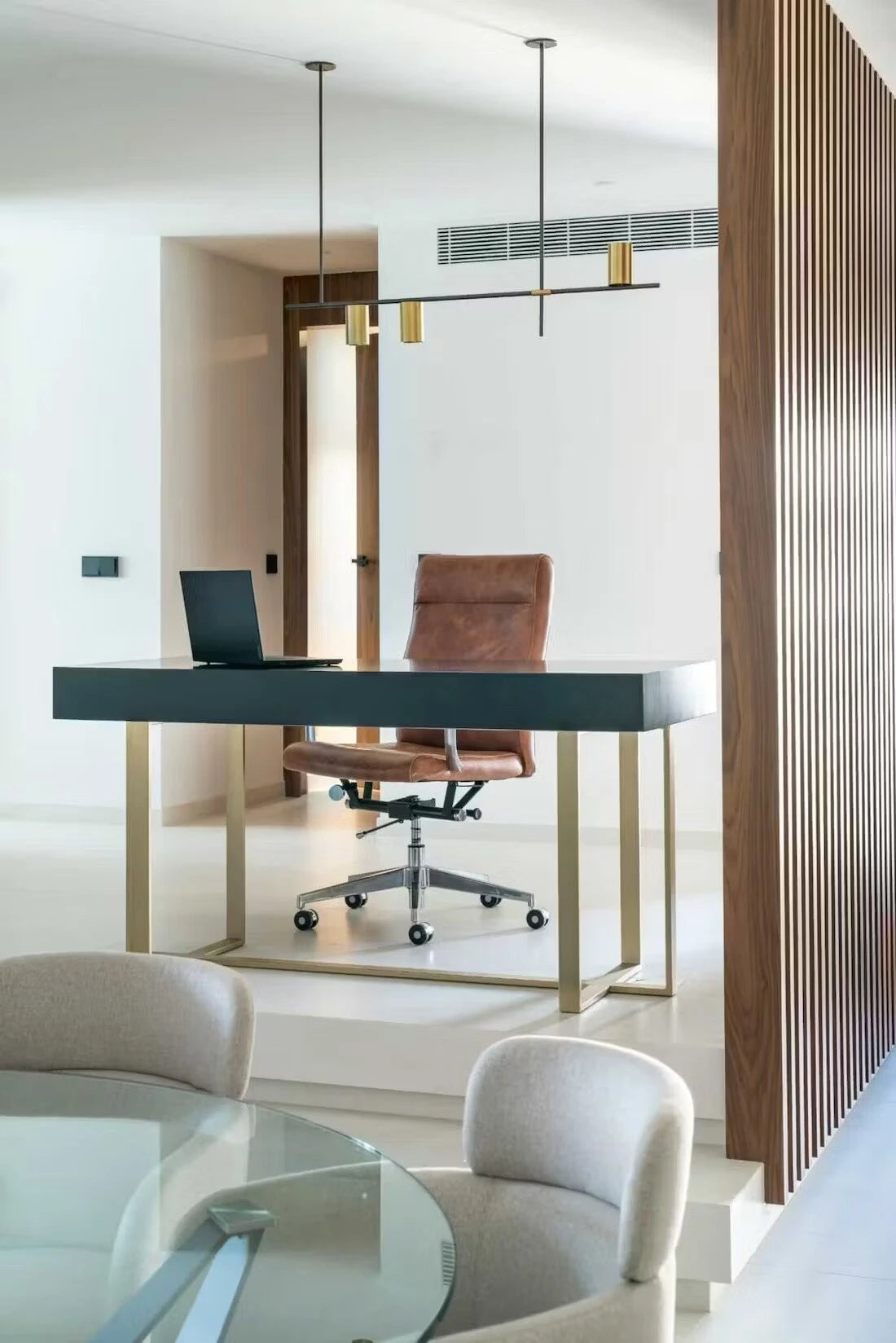 Silestone Charcoal Soapstone office desk with sleek dark finish and gold legs — premium quartz countertops near me by Signature Stone Las Vegas