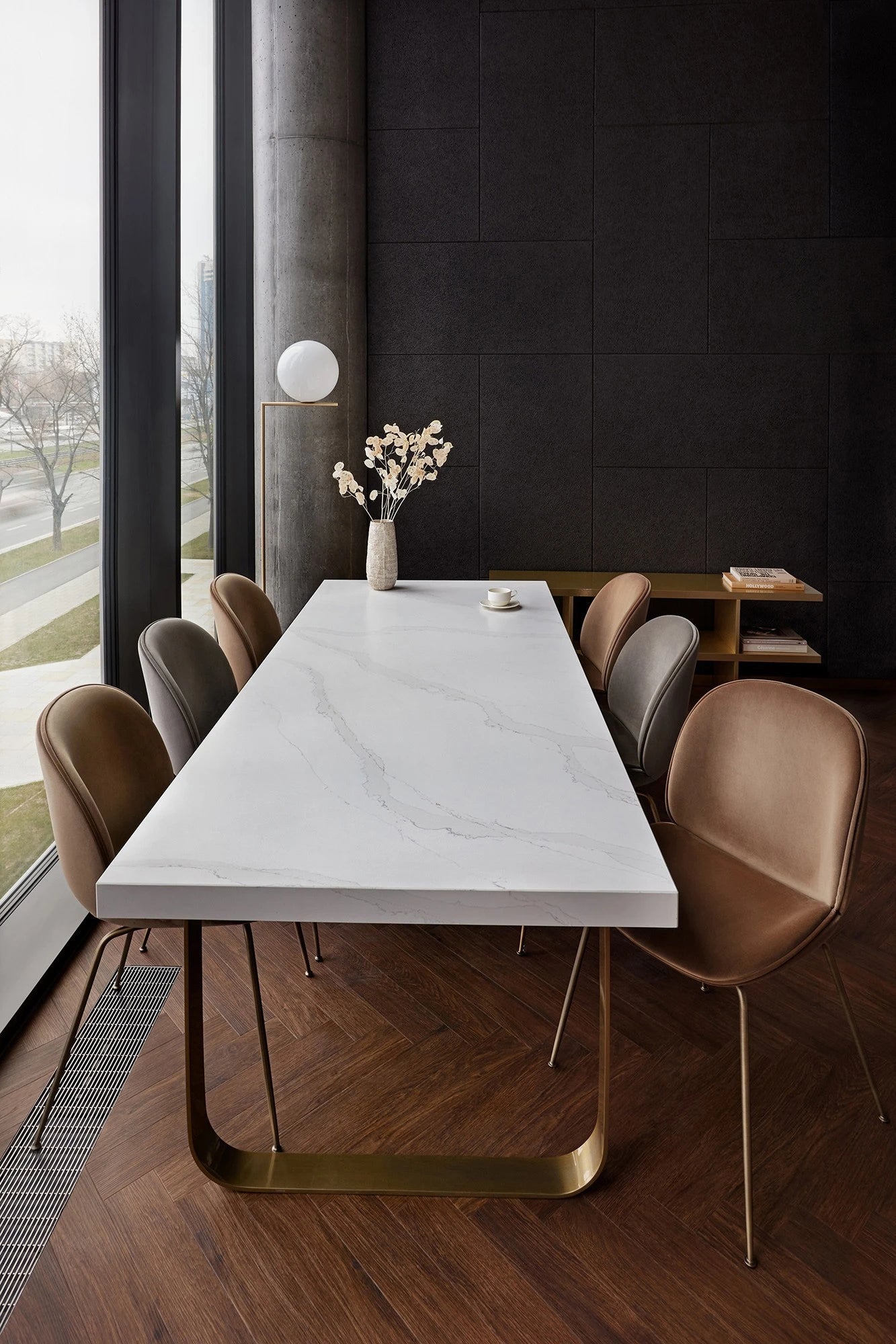 Silestone quartz dining table with white Calacatta veining and gold base in modern kitchen — quartz countertops near me by Signature Stone Las Vegas