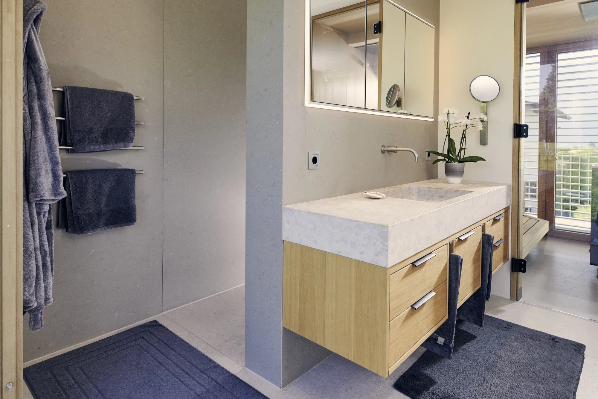 Silestone Coral Clay quartz bathroom vanity with integrated sink and light wood cabinetry — premium quartz countertops near me by Signature Stone Las Vegas