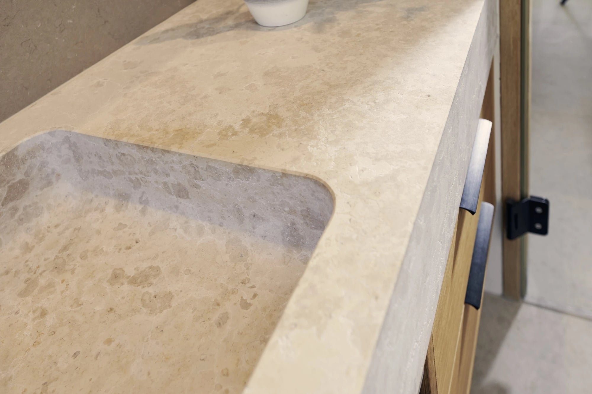 Silestone Coral Clay bathroom vanity with integrated sink featuring warm beige tones and smooth finish — quartz countertops installed by Signature Stone Las ...