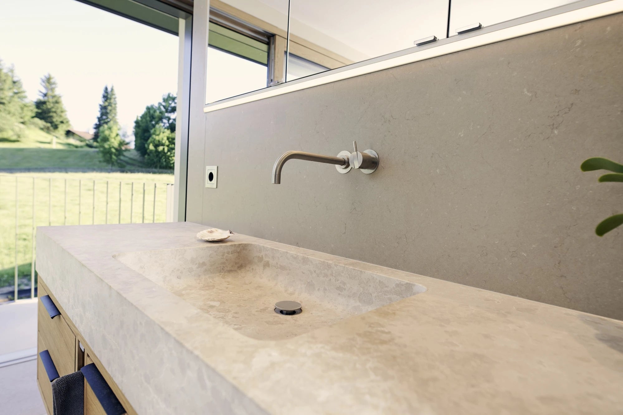 Silestone Coral Clay bathroom vanity with integrated sink and matte beige finish — engineered quartz countertops fabricated and installed by Signature Stone LV