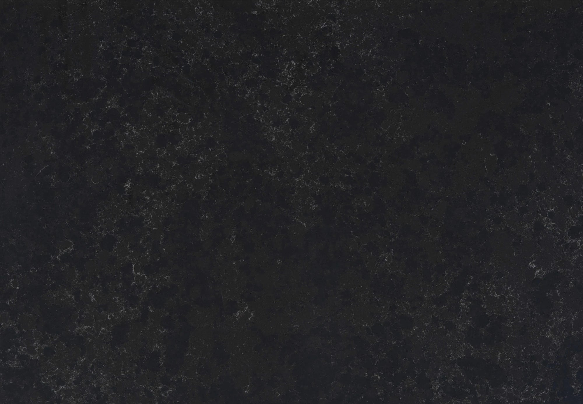 Silestone Corktown surface with deep charcoal background and subtle speckled texture — engineered quartz countertops fabricated and installed by Signature St...