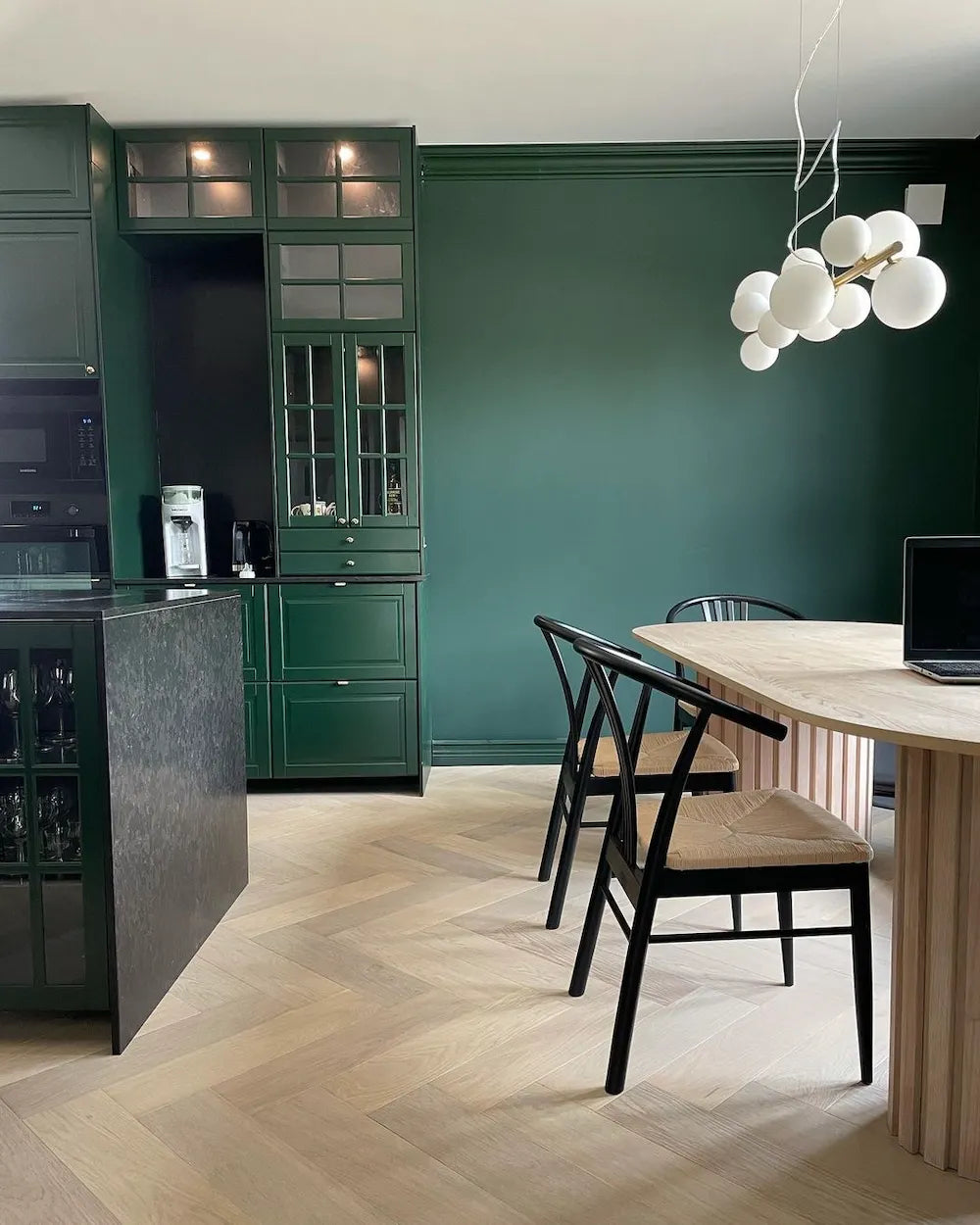 Silestone Corktown quartz kitchen island with gray veined surface and black dining chairs — premium quartz countertops near me by Signature Stone Las Vegas
