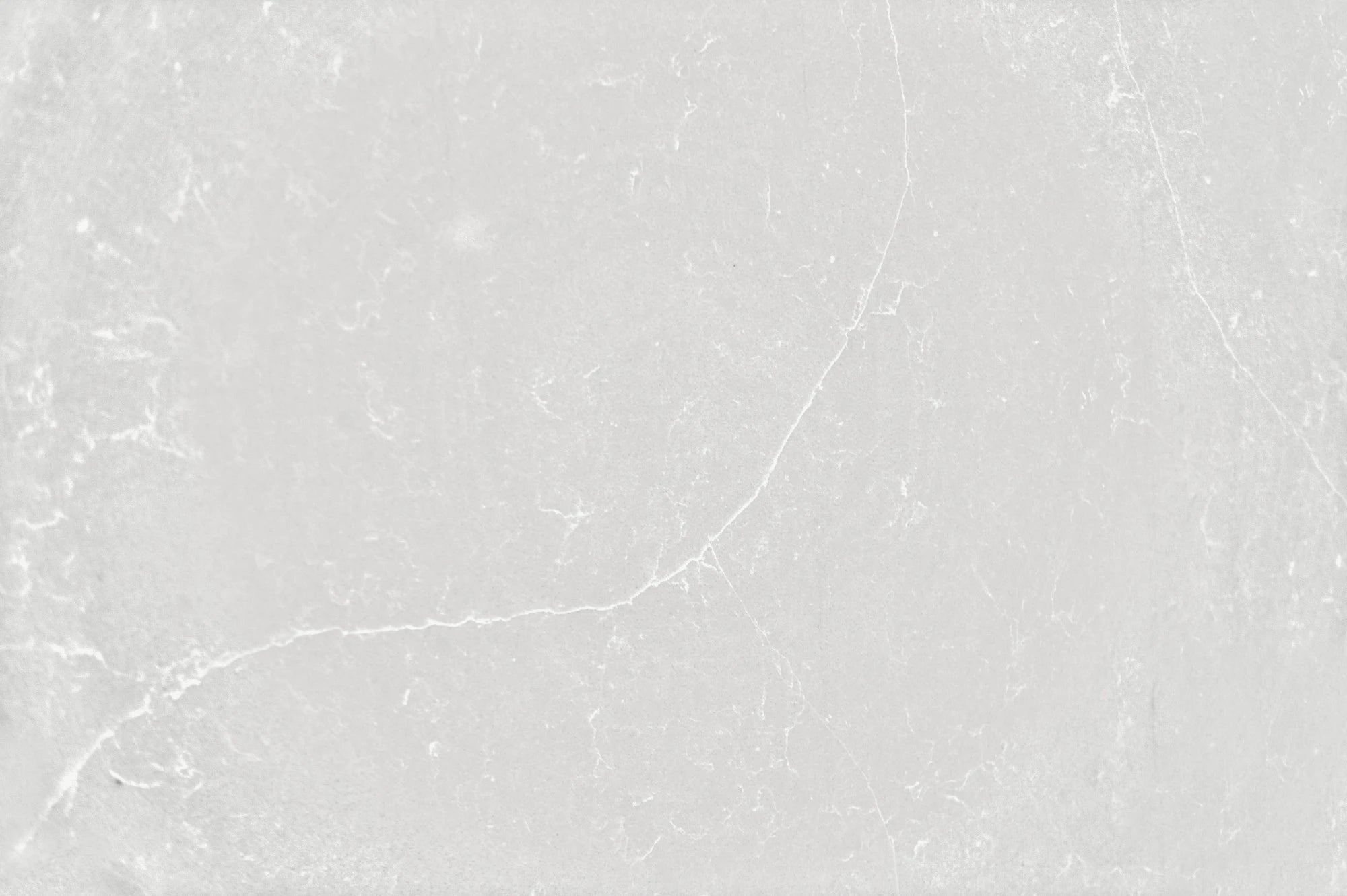 Silestone Desert Silver countertop surface featuring elegant light gray marble-like veining and polished finish — engineered quartz countertops fabricated an...