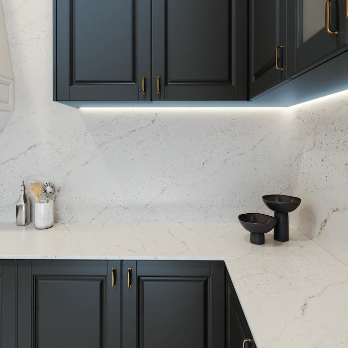 Silestone Eclectic Pearl kitchen countertops with white marble-look veining and dark navy cabinets — engineered quartz countertops fabricated and installed b...