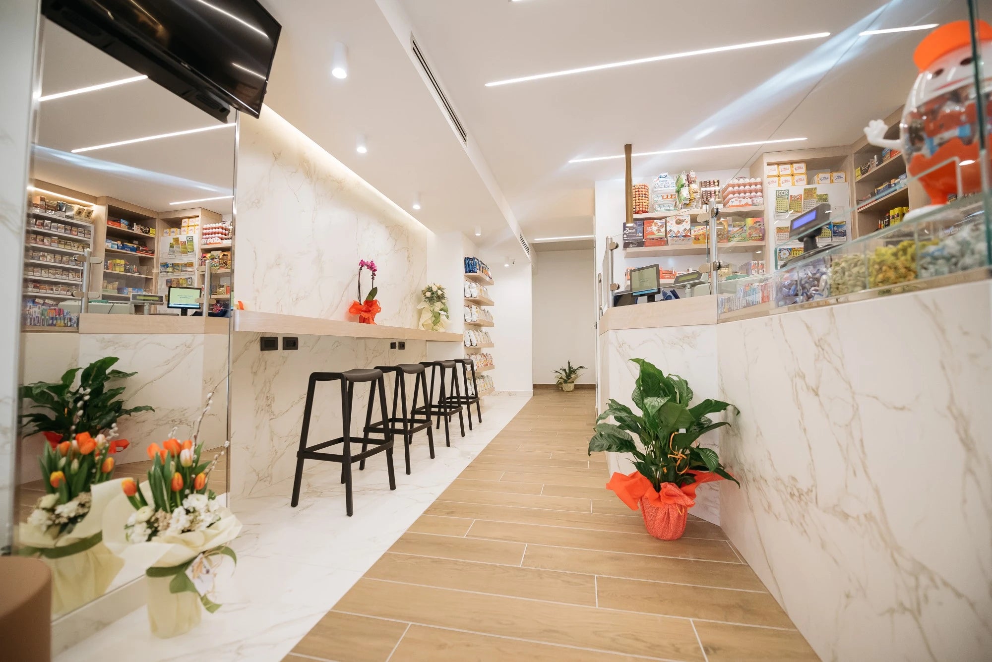 Dekton Entzo commercial countertops with white marble veining and waterfall edge — premium dekton surfaces fabricated and installed by Signature Stone LV