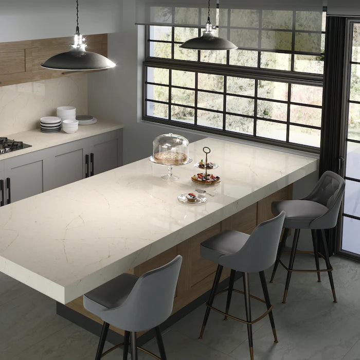Silestone Et Marfil quartz island countertop with light beige tone and clean edges in modern kitchen — quartz countertops near me by Signature Stone Las Vegas