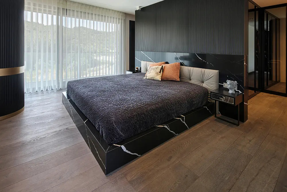 Silestone Et Marquina quartz platform bed base with dramatic black marble veining and white accents — quartz countertops near me by Signature Stone Las Vegas