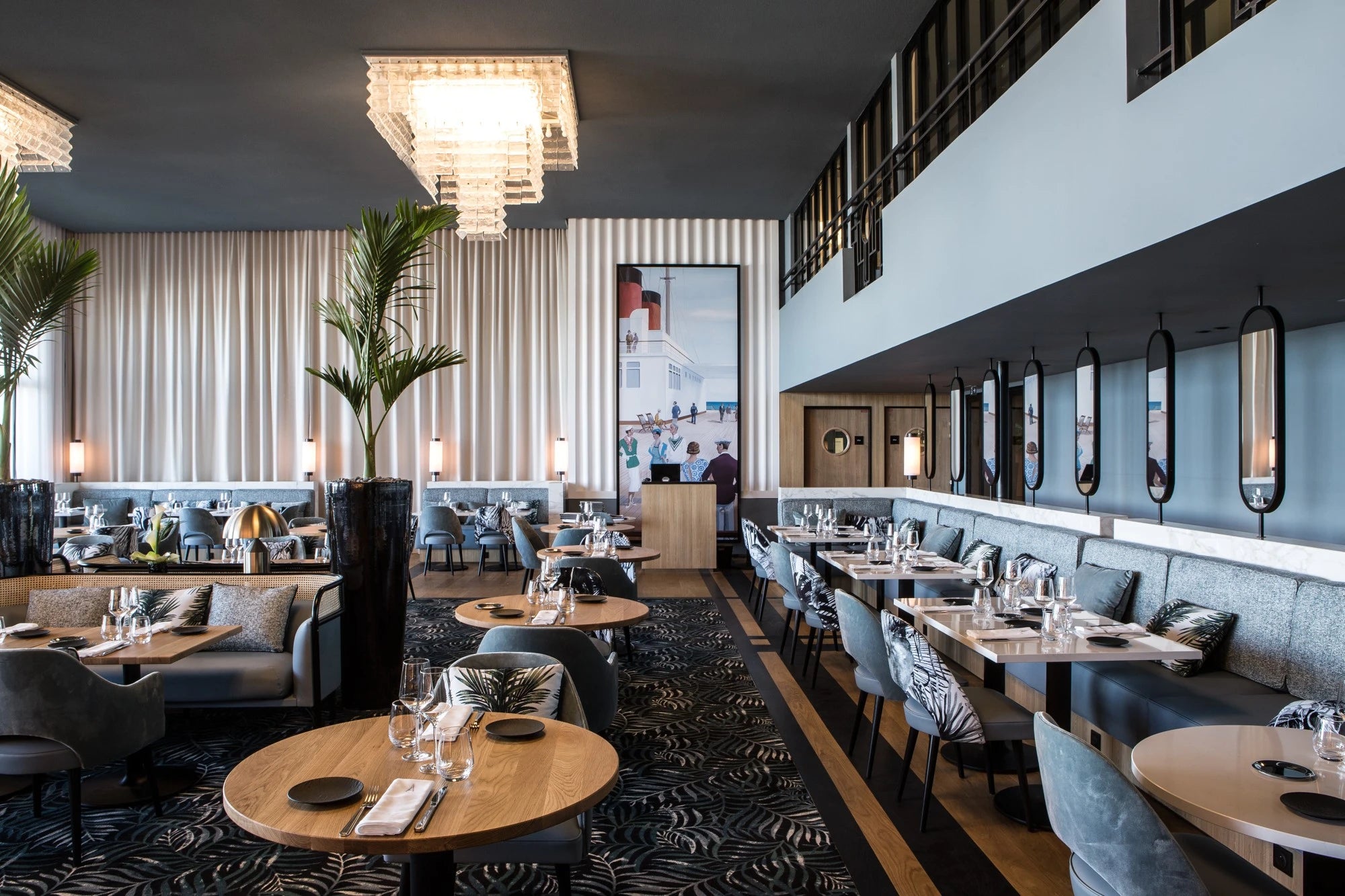 Silestone Et Statuario restaurant tables with white marble-look surfaces and polished finish — premium quartz countertops installed by Signature Stone Las Vegas