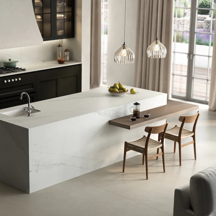 Silestone Ethereal Dusk kitchen island with white marble-look veining and waterfall edge — engineered quartz countertops fabricated and installed by Signatur...