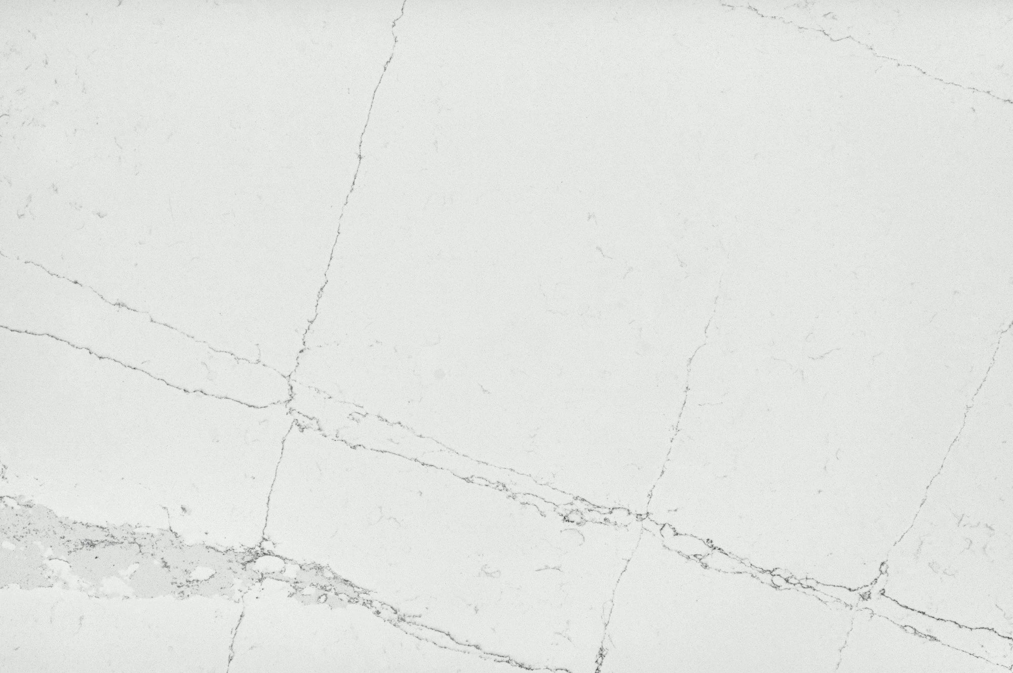 Silestone Ethereal Dusk surface with soft white base and delicate gray veining — engineered quartz countertops fabricated and installed by Signature Stone LV